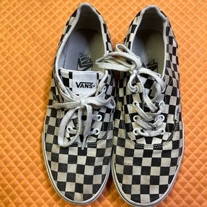 Woman’s checkered vans